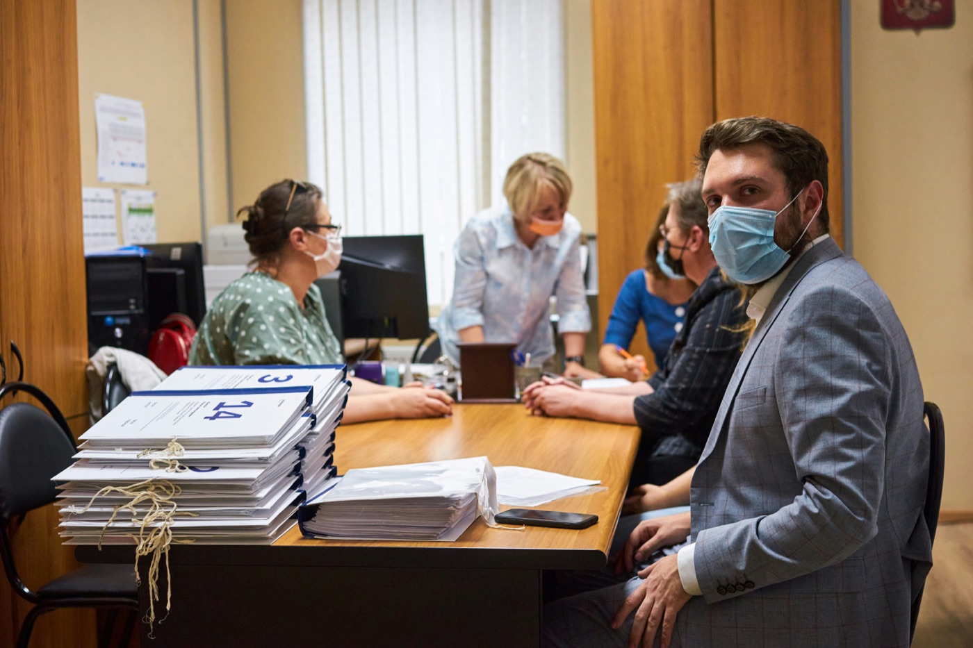 Patient at the reception desk on a first visit